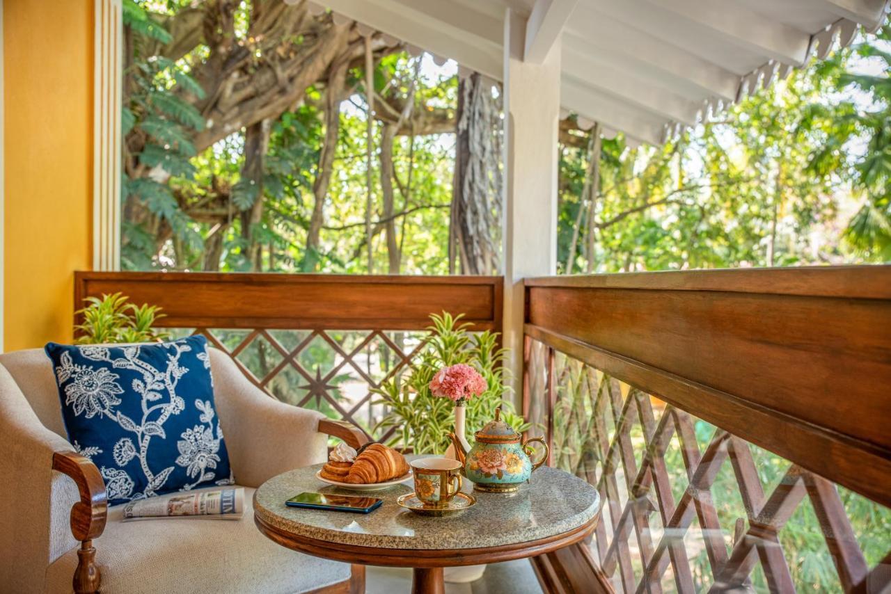 ทัช ฮอลิเดย์ วิลเลจ รีสอร์ต แอนด์ สปา กัว Hotel แคนโดลิม ภายนอก รูปภาพ A balcony at the hotel