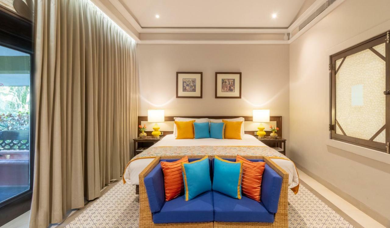 ทัช ฮอลิเดย์ วิลเลจ รีสอร์ต แอนด์ สปา กัว Hotel แคนโดลิม ภายนอก รูปภาพ A bedroom at the hotel